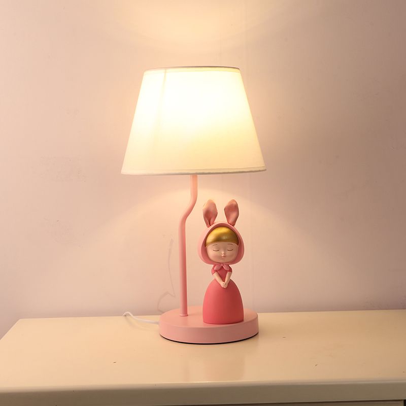 Tapered Drum Nightstand Lamp Kids Fabric Single-Bulb Bedroom Table Light with Resin Figurine in Pink