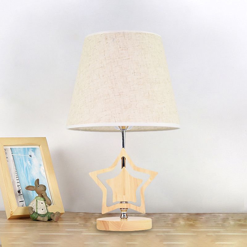 Wood Star Nightstand Lamp Modern 1 Light Table Light with Barrel Fabric Shade in Beige