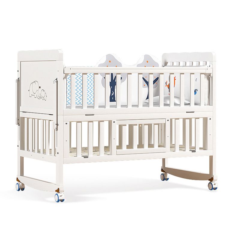 Scandinavian 2-in-1 Solid Wood Nursery Bed in White Wheels and Storage