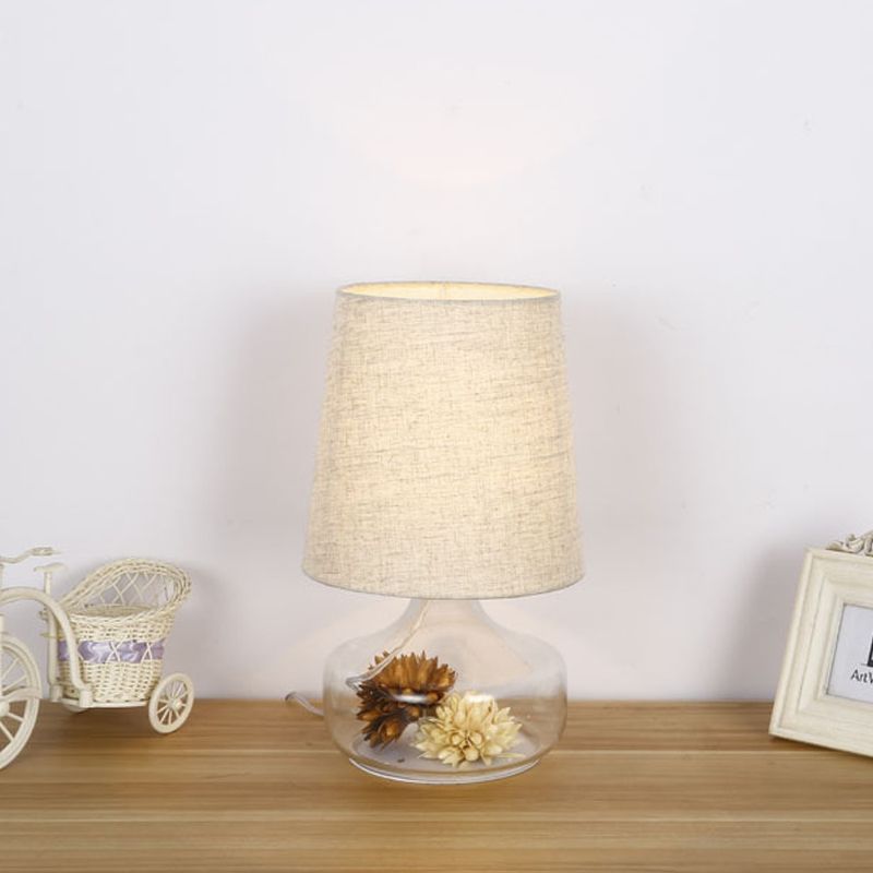 1-Head Fabric Desk Lighting Pastoral Cream Gray Tapered Bedroom Night Light with Clear Glass Base and Flower