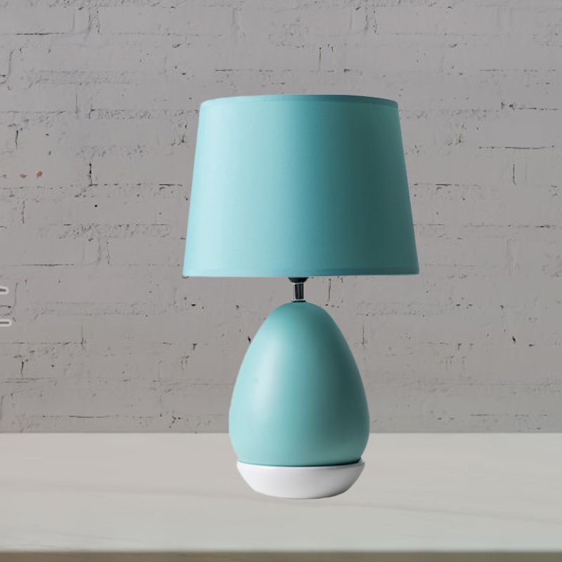 Egg-Shaped Bedside Night Light Modern Ceramic 1 Head Blue Table Stand Lamp with Drum Fabric Shade