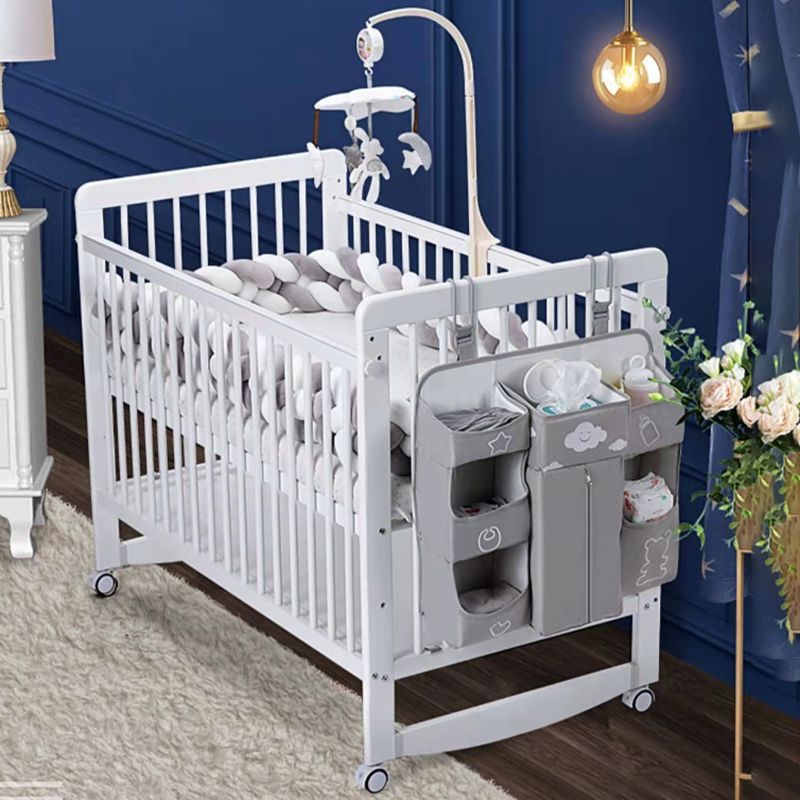 Crib with Guardrail in White Adjustable Height and Storage Crib