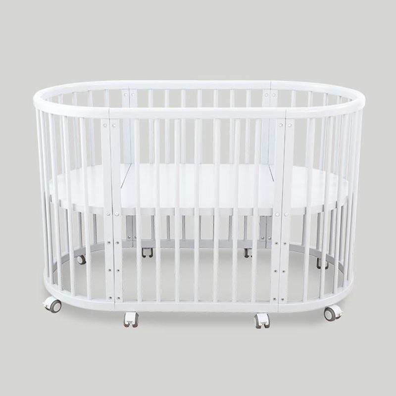 Oval Solid Wood Crib Nordic Style 5-In-1 Convertible Crib with Casters