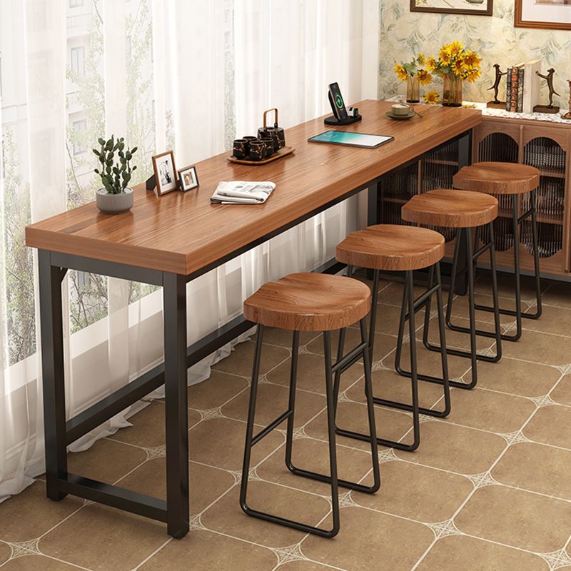 Industrial Wooden Counter Table with Metal Trestle Base in Brown