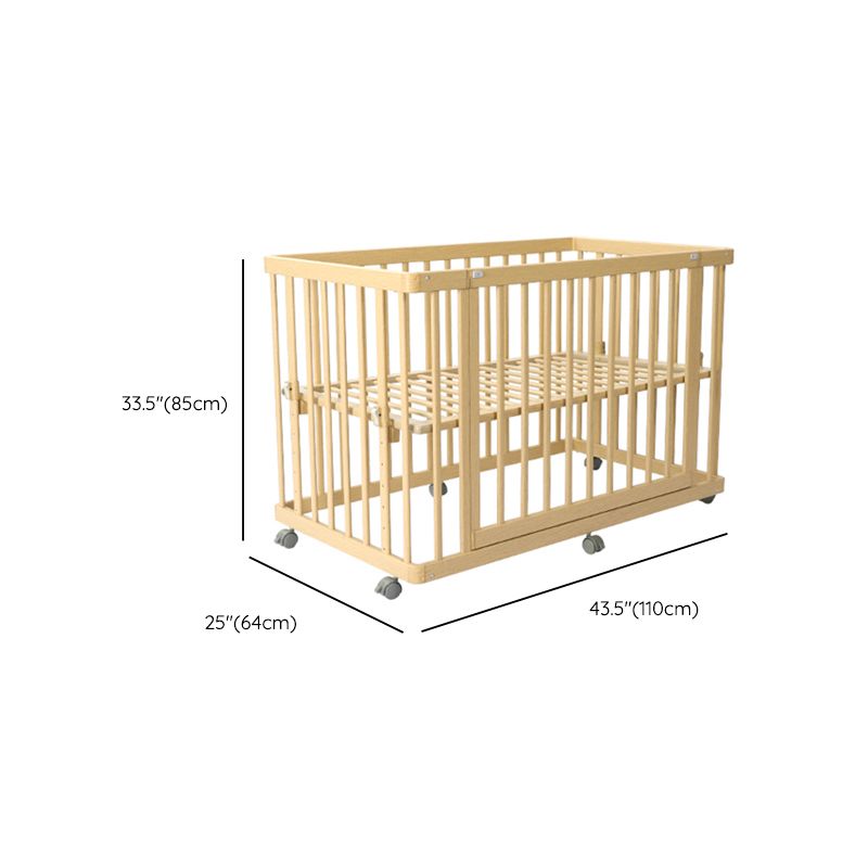 Contemporary 25.19" Wide Wooden Nursery Bed in Natural with Wheels