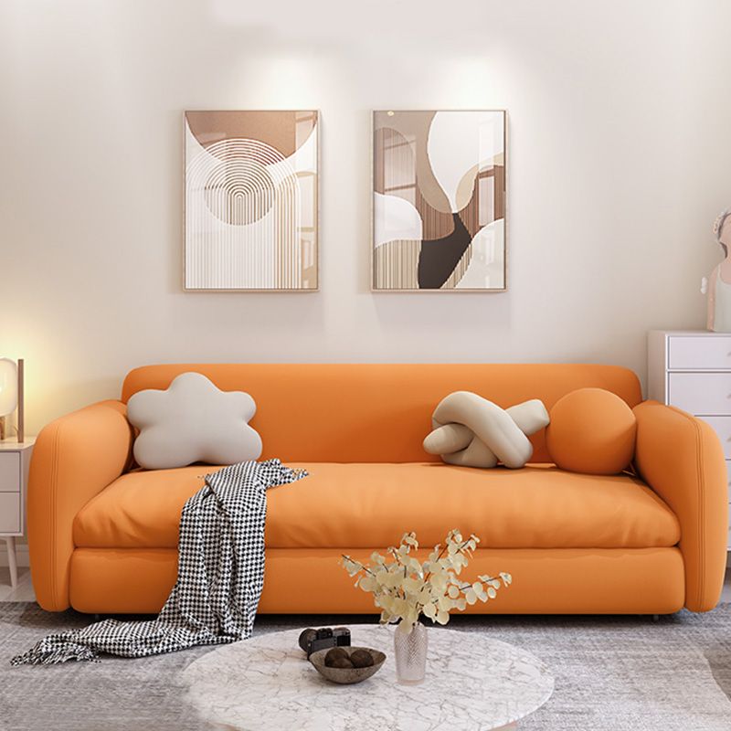 Orange Sleeper Sofa with Tight Back and Square Arms in Faux Leather