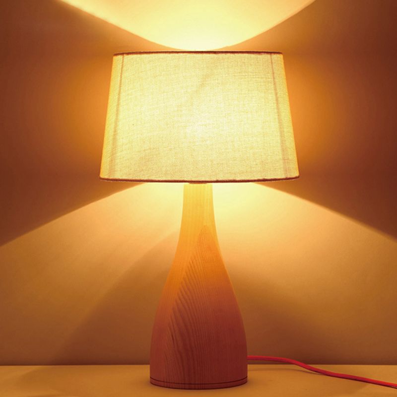 Tapered Drum Night Light Minimal Fabric Single Bedside Table Lighting with Vase Pedestal in Wood