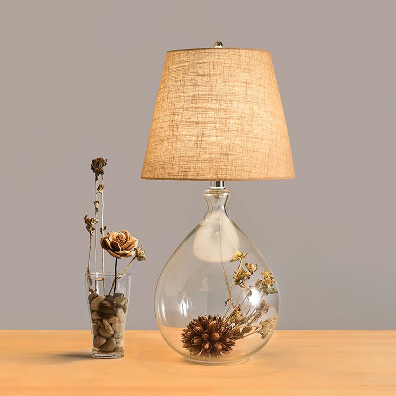 Modern 1 Head Table Light Clear Waterdrop/Bottle Glass Night Lighting with Dried Flower Decor and Flaxen Fabric Shade