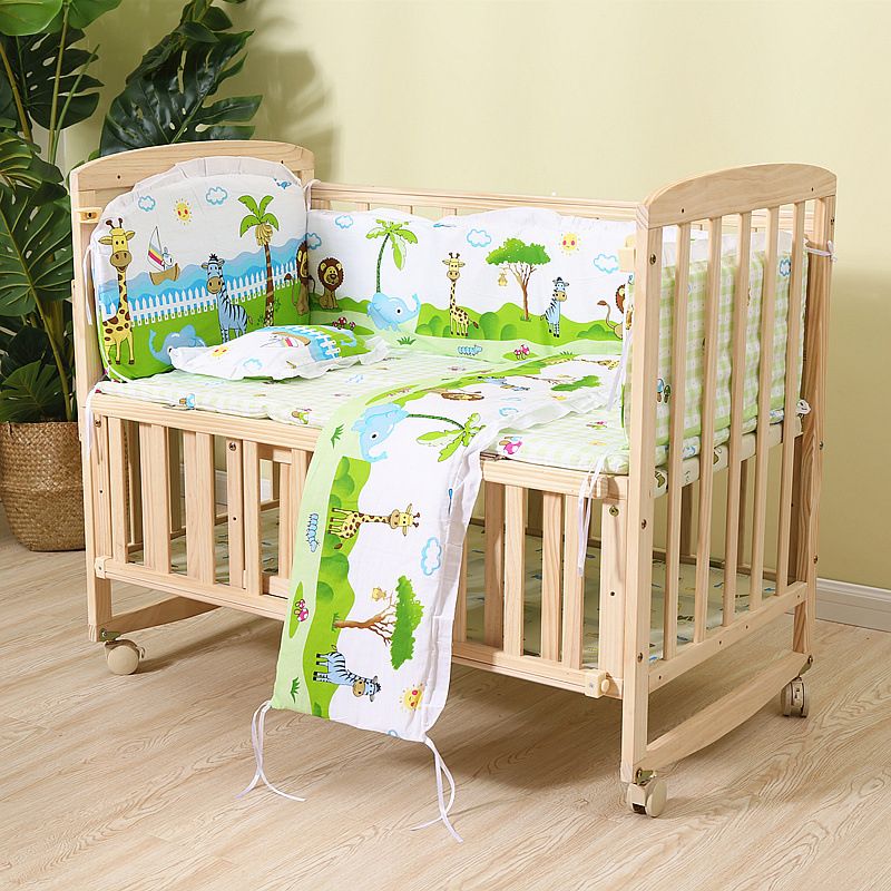 Convertible Nursery Crib with Casters and Changing Table in Light Wood