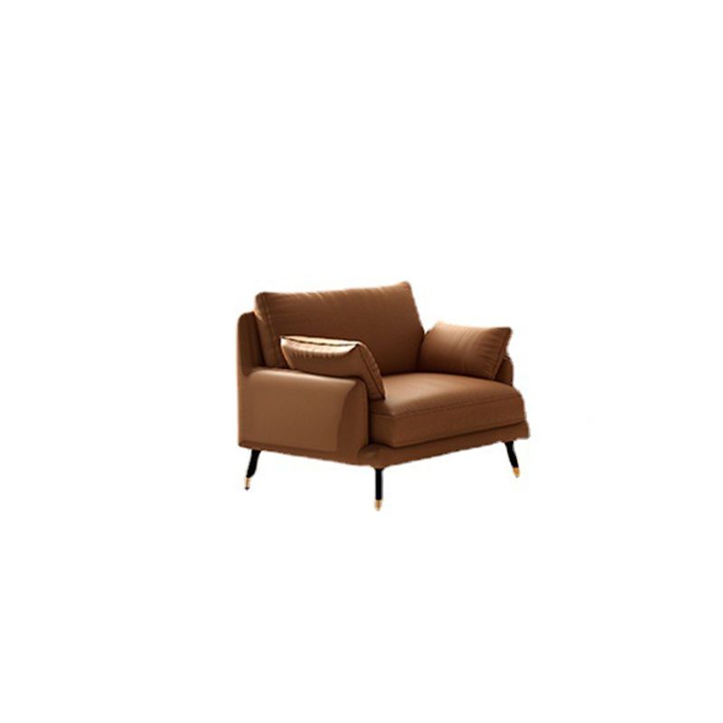Sofá de brazo empotrado de muebles de cuero marrón con almohadas