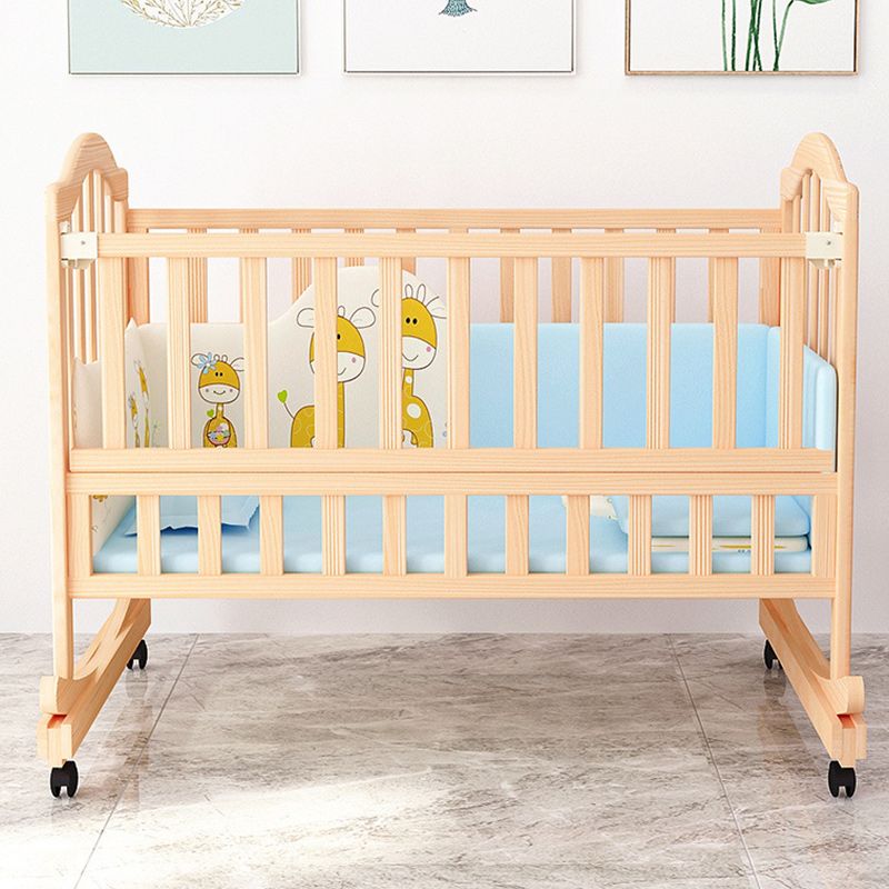 2-in-1 Wooden Crib with Casters Natural Mini Crib with Guardrail and Mattress