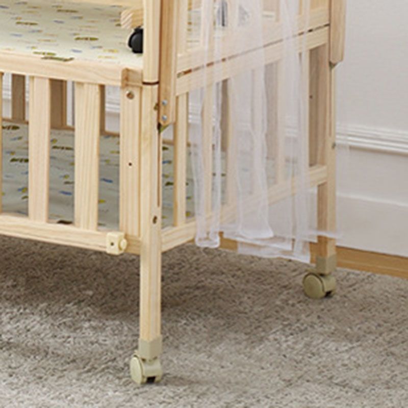 Contemporary Solid Wood Baby Crib with Under Crib Storage in Natural