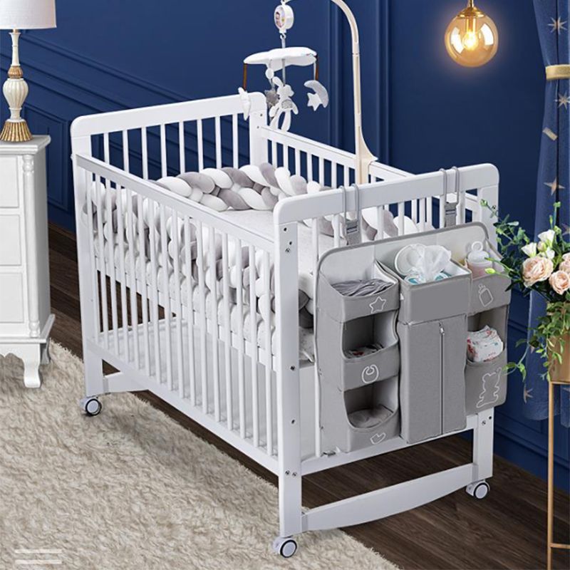 Contemporary Wood Nursery Bed in White with Wheels and Storage