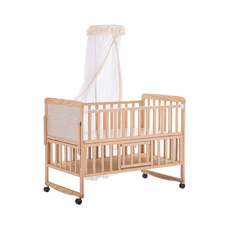 2-in-1 Solid Wood Crib with Guardrails Natural Mini Crib with Casters