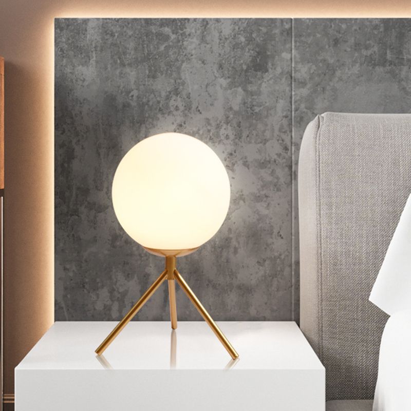 Opal Glass Sphere Desk Light Modern 1 Bulb Night Table Lamp in Gold/Black with Metal Tripod