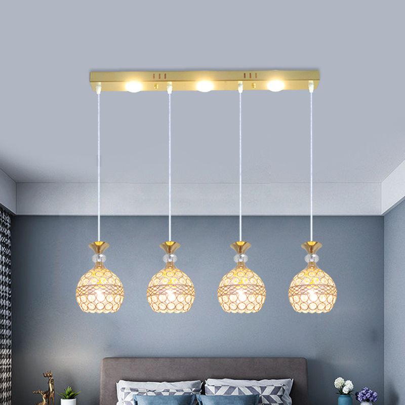 4 têtes salle à manger multiple plafonnier moderniste fin finition pendule lampe avec une teinte incorporée en cristal globe