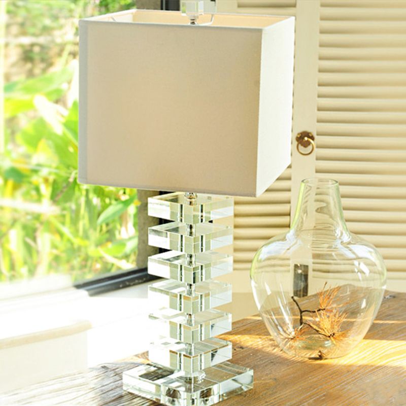 1 Head Living Room Desk Light Modern Clear Multi-Layer Crystal Night Table Lamp with Cubic Beige Fabric Shade