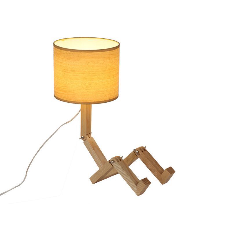 Lampe de table en forme d'homme Nouveauté en bois moderne Single Single Béges / noir / blanc Lumière de nuit avec conception de rack de livres et nuance de tissu de cylindre