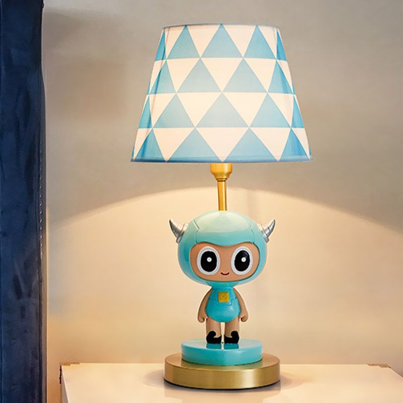 Cartoon Cow Boy Resin Night Lamp 1-Light Table Lighting with Triangle Print Shade in Pink/Blue