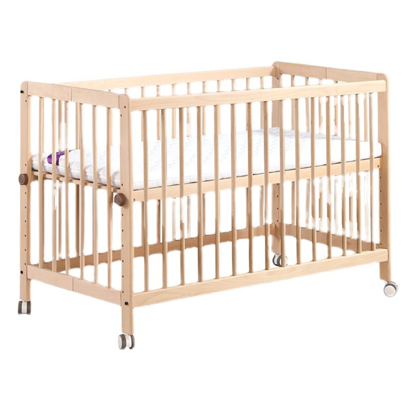 2-in-1 Folding Wooden Crib Natural Baby Crib with Mattress and Casters