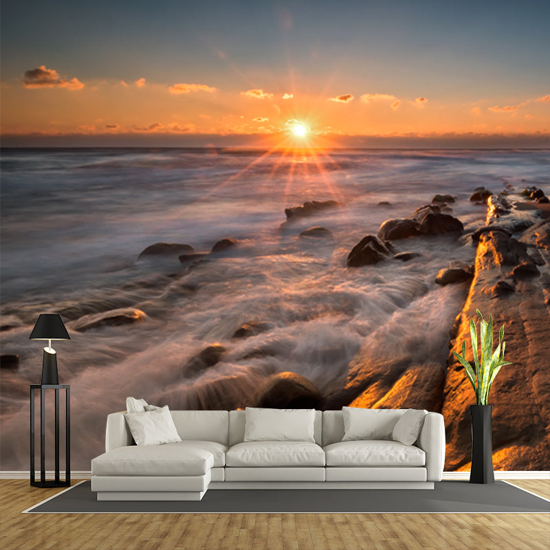 Non-Woven Washable Mural Contemporary Man in Rock Coast at Sunset Wall Decor in Yellow-Blue