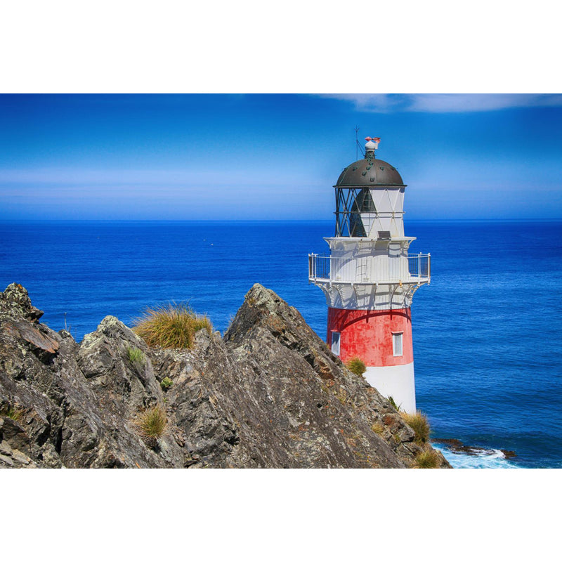 Large Lighthouse and Sky Mural Wallpaper Coastal Sea Landscape Wall Covering in Blue