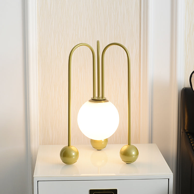 Metal U-Shaped Table Lamp Contemporary 1 Bulb Black/Gold Night Light in Warm/White Light with Ball Opal Glass Shade