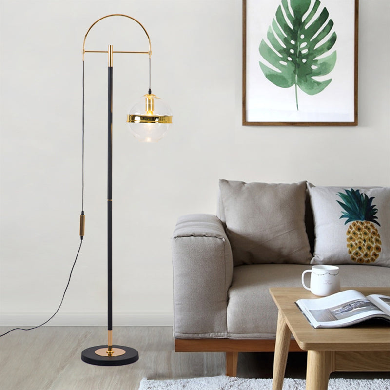 1-Head Living Room Floor Lighting Modern Black and Gold Curved Standing Lamp with Globe Clear Glass Shade in White/Yellow Light