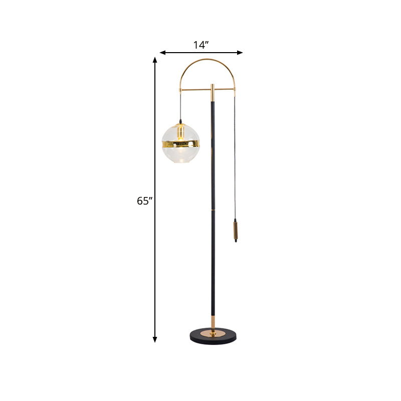 1-Kopf-Wohnzimmerbodenbeleuchtung moderne schwarz und golden gebogene stehende Lampe mit Globus klarer Glasschatten in Weiß/Gelblicht