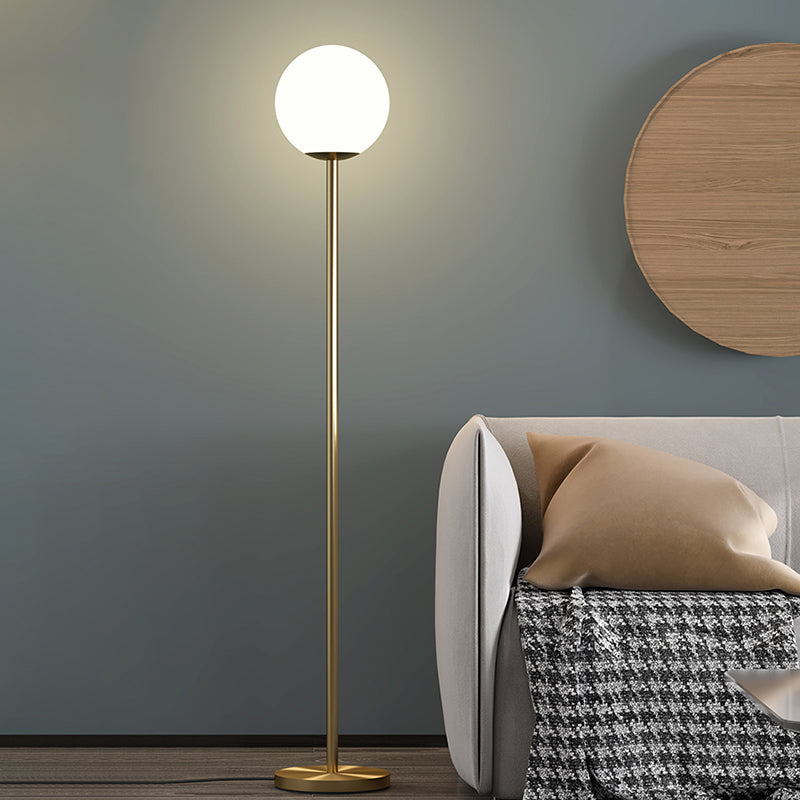 Milky Glass Sphere Reading Floor Light Modern 1 Light Brass Finish Standing Lighting for Bedroom