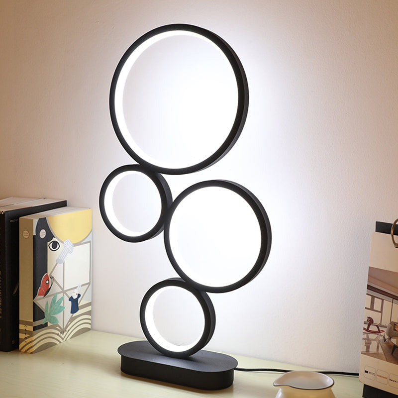 Simple Stacked Round Table Lamp Metallic LED Bedside Night Lighting with Circular Pedestal in Black, Warm/White Light