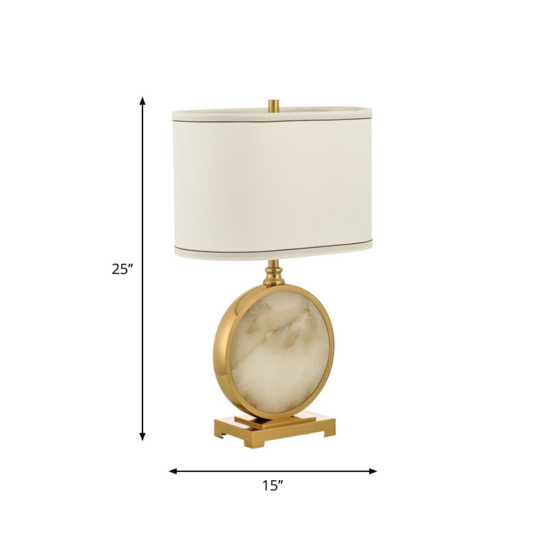 Fabric Oval Night Lamp Minimalism 1 Head Table Stand Light with Round Base in Brass and White