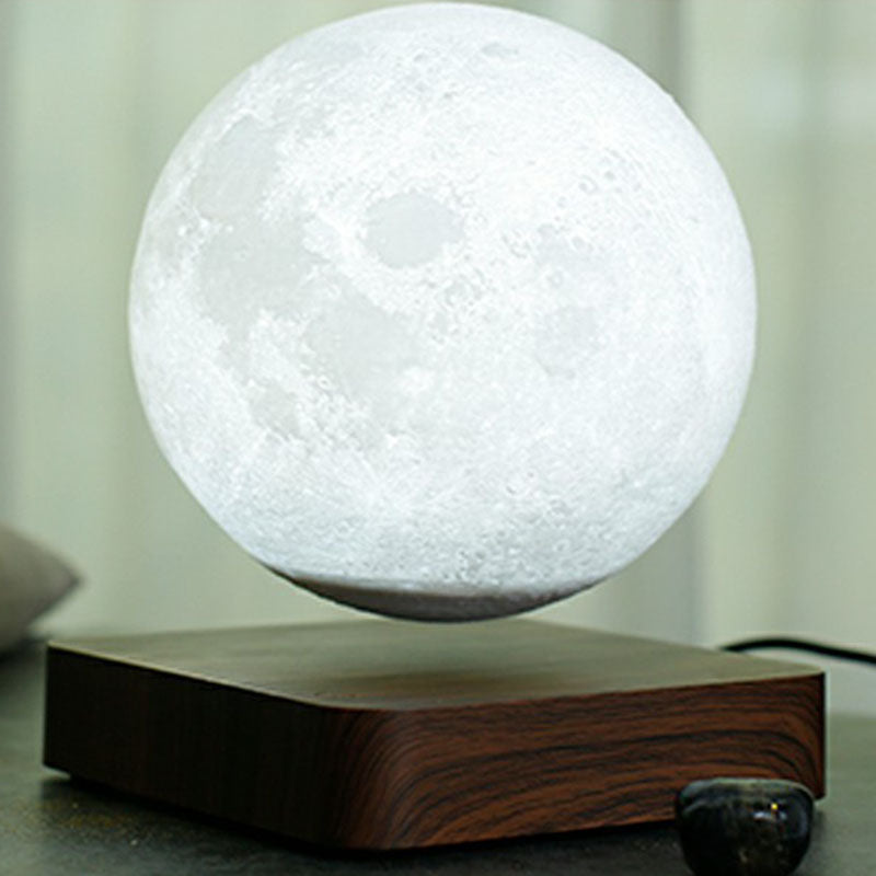 Levitación magnética Lámpara de mesa LED de plástico para niños nocturnos en forma de luna con base de madera cuadrada