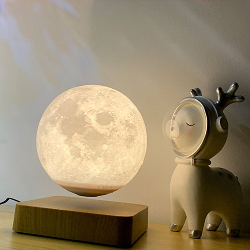 Levitación magnética Lámpara de mesa LED de plástico para niños nocturnos en forma de luna con base de madera cuadrada