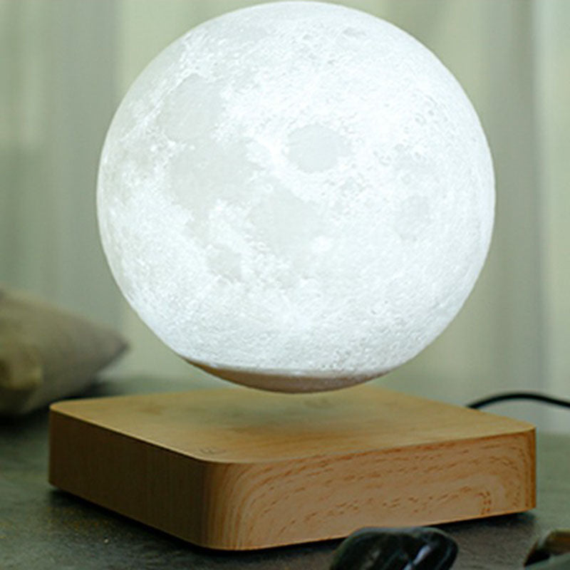 Levitación magnética Lámpara de mesa LED de plástico para niños nocturnos en forma de luna con base de madera cuadrada