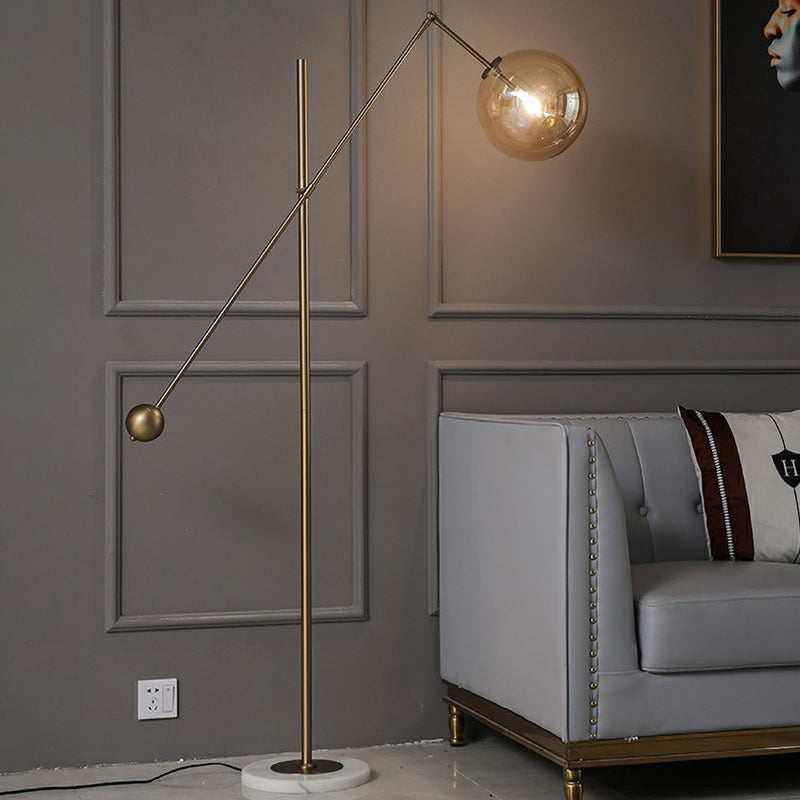 Amber Glass Sphere Floor Lamp Simplicity 1-Light Bronze Standing Light with Balance Arm