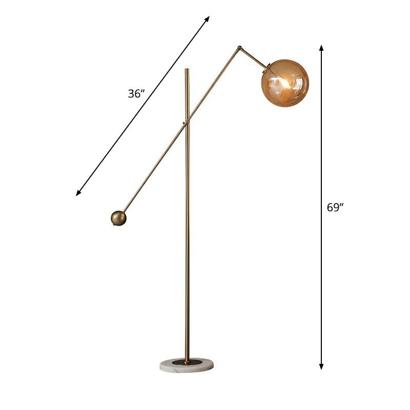 Lampada da pavimento sfera di vetro ambra semplicità a 1 luce in bronzo in piedi con braccio di equilibrio