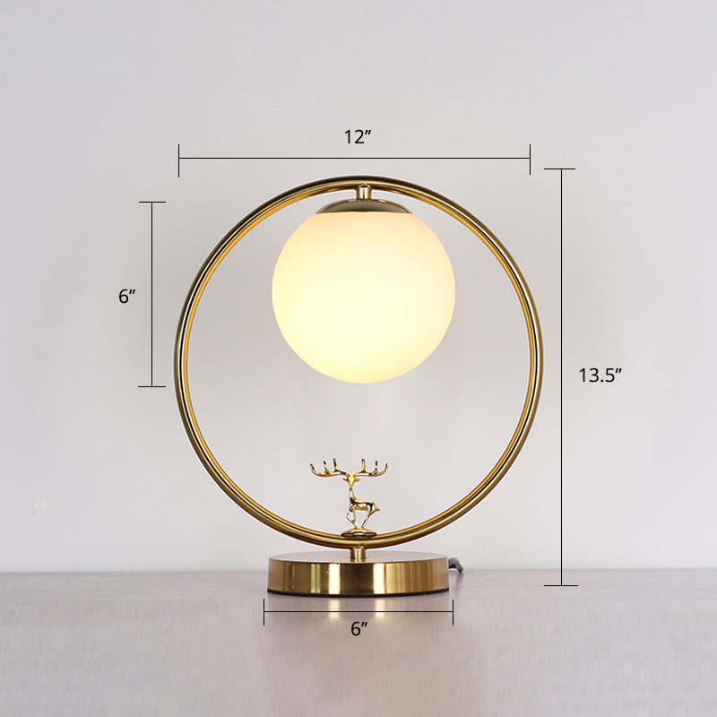 Ivory Glass Ball Table Light Simple Style 1-Light Gold Night Lamp with Metal Ring and Deer Deco