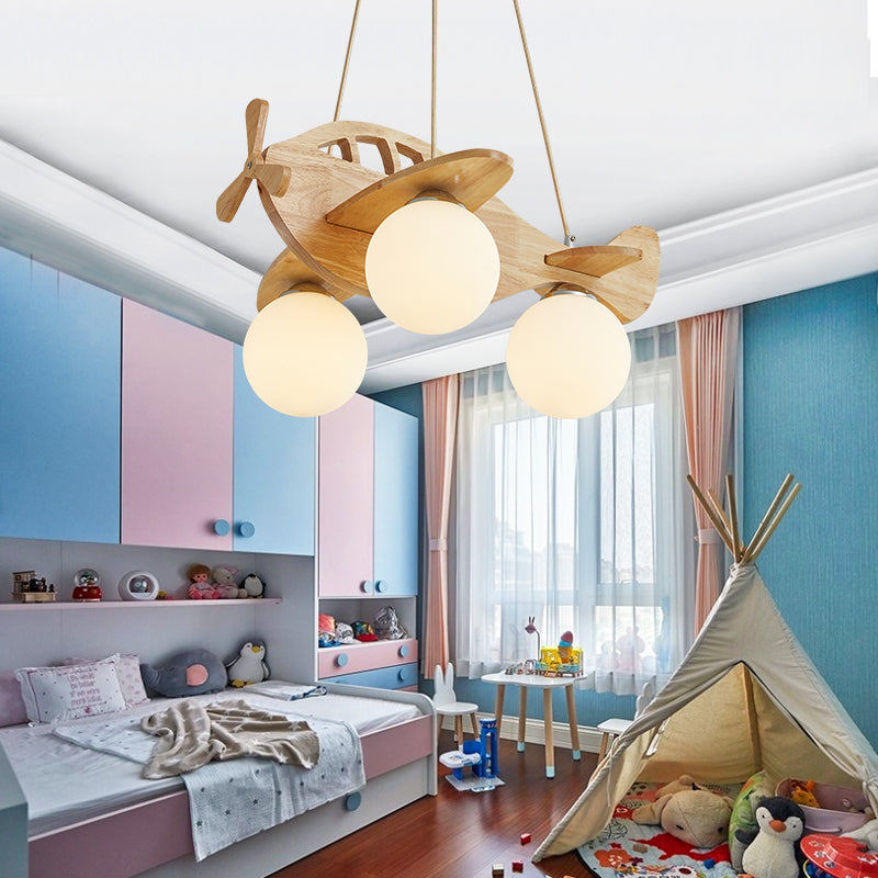 Cartoon Aircraft Pendant Chandelier Wooden 3-Bulb Kids Room Hanging Light with Ball White Glass Shade