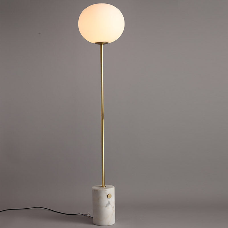 Crème glazen eivormige vloerlicht minimalistische stand-up opstaanlamp met cilindrische marmeren basis