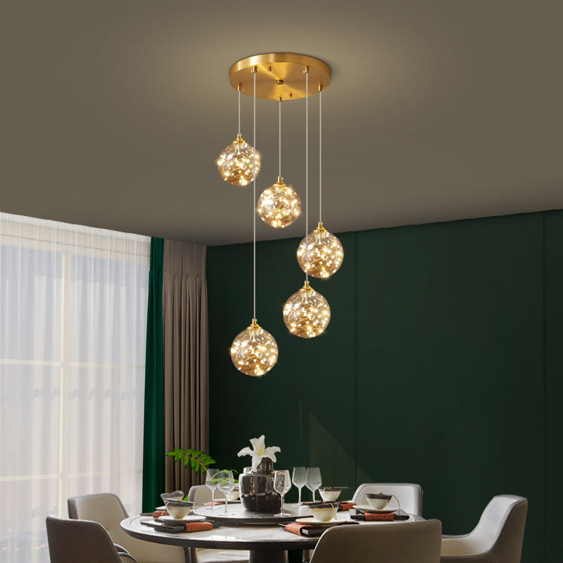 Brass Finish Globe Suspension Lamp Nordic Amber Glass LED Starry Pendant Lighting for Bedroom