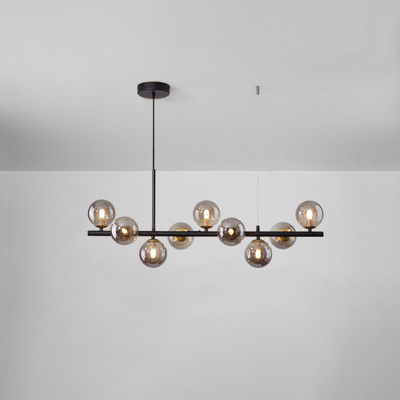 Chandelier linéaire léger en laiton à 9 laiton Scandinave avec des teintes en verre givrées