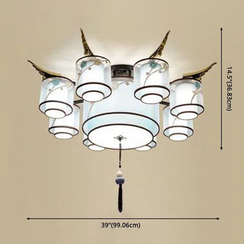 Tela de iluminación semi de montura cilíndrica vintage cerca de la luz del techo en azul cielo con nudo de borla