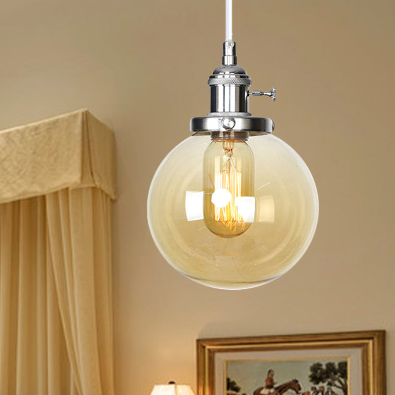 Orbit Hanging Lighting Farmhouse Amber/Clear Glass 1 bol hanglamp met verstelbaar koord in zwart/brons/messing afwerking