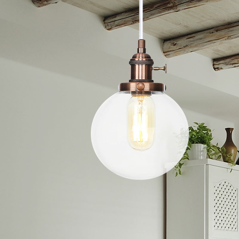 Orbit Hanging Lighting Farmhouse Amber/Clear Glass 1 bol hanglamp met verstelbaar koord in zwart/brons/messing afwerking