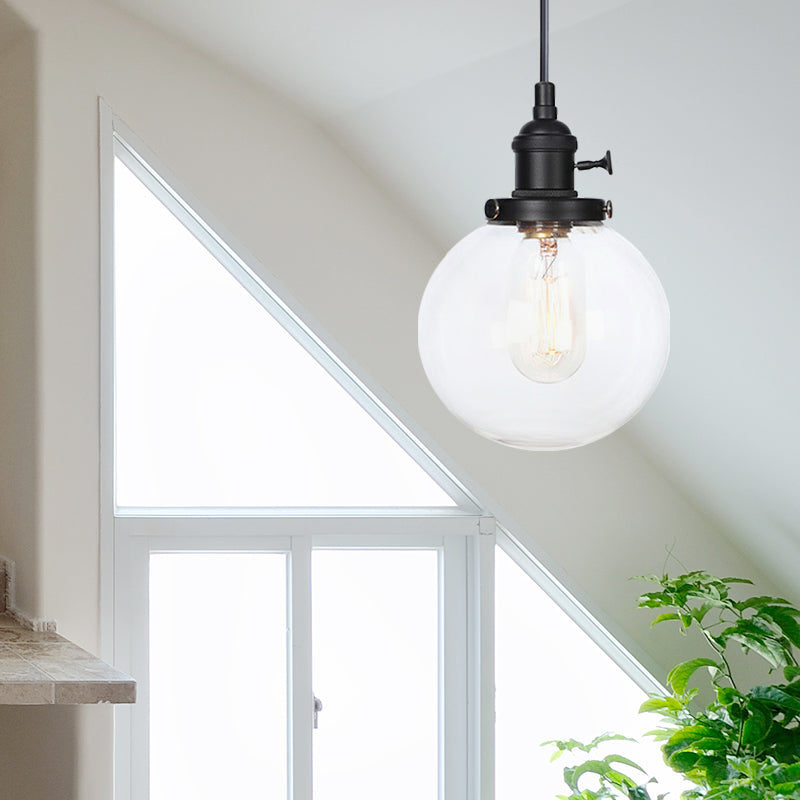 Orbit Hanging Lighting Farmhouse Amber/Clear Glass 1 bol hanglamp met verstelbaar koord in zwart/brons/messing afwerking