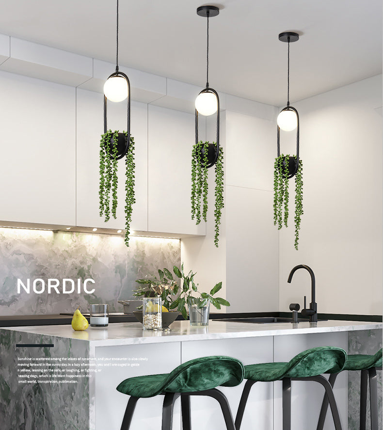 Black 1 Light Spherical Pendant Light Nordic Retro Oval Metal Ring Shade Hanging Lamp with Green Plant