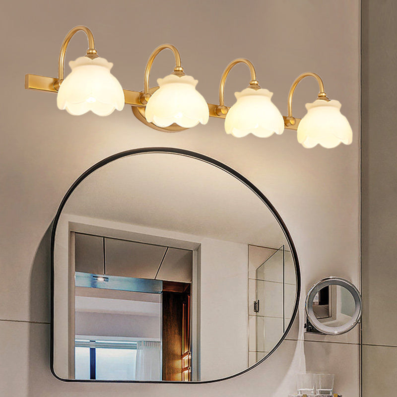 Luz de espejo de tocador de baño Blossom LED tradicional de metal 2/3/4 Lámpara montada en la pared de latón