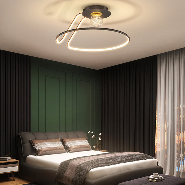 Minimalist Curvaceous Flush Lamp Metallic Bedroom Flush Mount Lighting with Starry Glass Shade