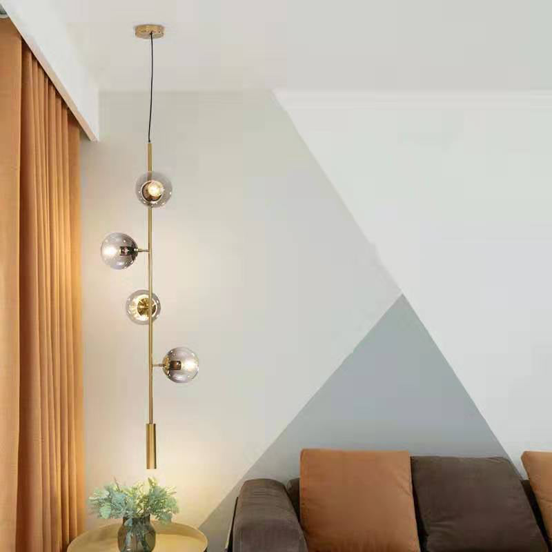 Modernistischer Globus Anhänger Beleuchtung graues Glas 4 Lampen Wohnzimmer Deckenleuchter in Gold mit Bleistiftarm